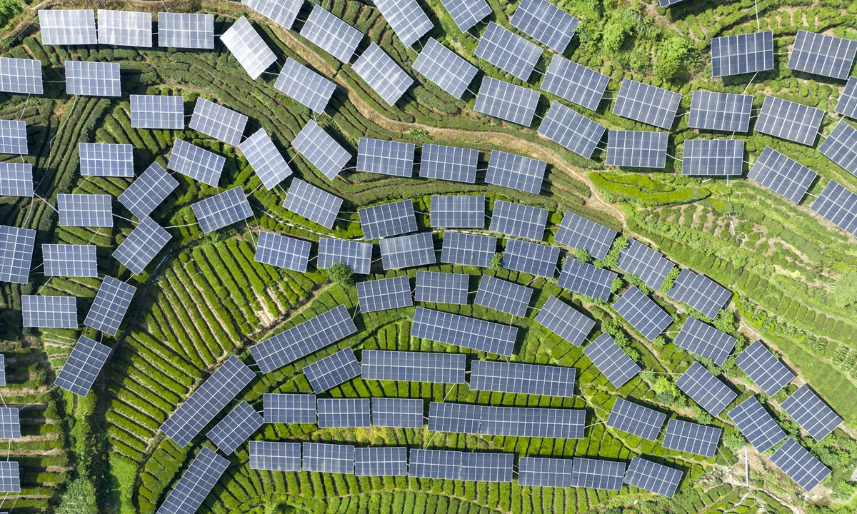 The photovoltaic (PV) panels in the tea fields deliver green electricity under the sunlight in Zigui county, Central China's Hubei Province, on June 28, 2026. To date, PV bases have been established in many regions across China, and they also serve as solid boosters for local ecological rehabilitation and economic growth. Photo: VCG