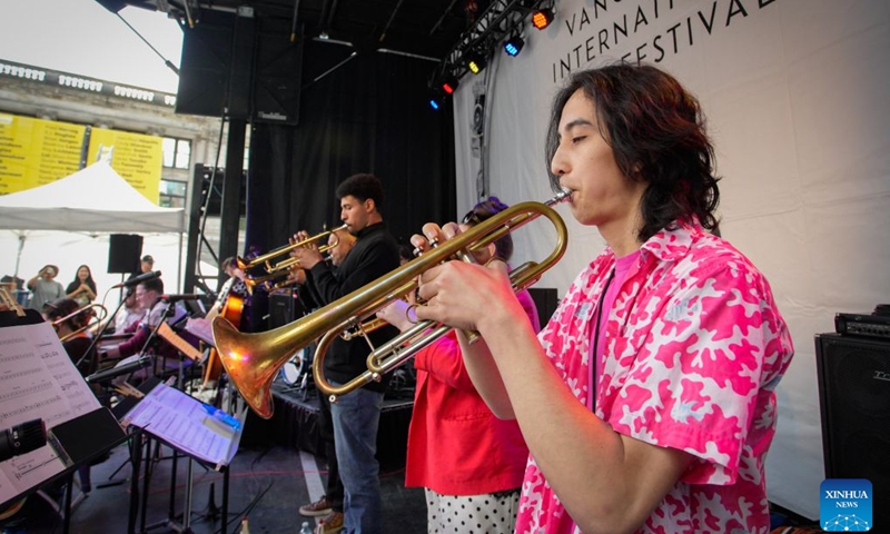 Musicians perform during the Downtown Jazz Weekend at the Vancouver Art Gallery plaza in Vancouver, British Columbia, Canada, on June 27, 2026. As part of the Vancouver International Jazz Festival, the two-day public event features local, national and international artists offering free live jazz performances to the public. The 17-day festival, running until July 5, features over 150 artists and 175 performances across Vancouver, celebrating jazz and diverse music styles. (Photo by Liang Sen/Xinhua)

