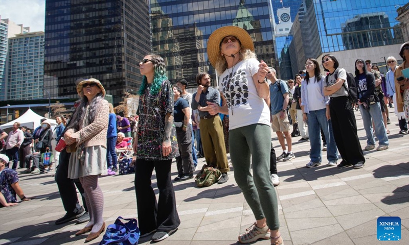 People enjoy free outdoor performances during the Downtown Jazz Weekend at the Vancouver Art Gallery plaza in Vancouver, British Columbia, Canada, on June 27, 2026. As part of the Vancouver International Jazz Festival, the two-day public event features local, national and international artists offering free live jazz performances to the public. The 17-day festival, running until July 5, features over 150 artists and 175 performances across Vancouver, celebrating jazz and diverse music styles. (Photo by Liang Sen/Xinhua)

