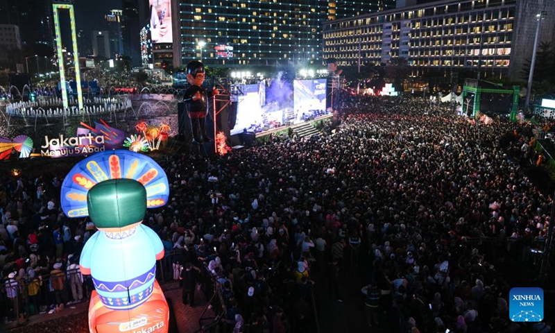 People gather to watch a performance during celebrations marking Jakarta's 499th anniversary in Jakarta, Indonesia, June 27, 2026. (Xinhua/Veri Sanovri)

