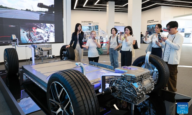 Media delegation members from the Republic of Korea (ROK) visit the headquarters of China's new energy vehicle (NEV) maker BYD in Pingshan District of Shenzhen, south China's Guangdong Province, June 25, 2026. From Tuesday to Friday this week, a six-member ROK media delegation paid a visit to Shenzhen, China's high-tech powerhouse, to get a first-hand sense of the city's dynamic development. (Xinhua/Liang Xu)

