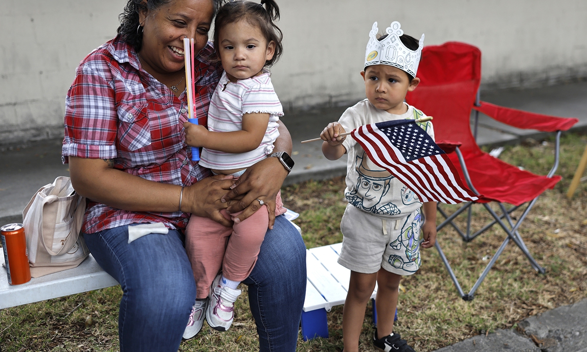People celebrate during the El Sereno Independence Day Parade in Los Angeles, California, on June 27, 2026.
