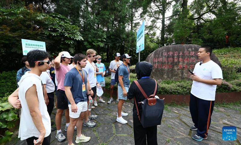 American youth visit a park in Kuliang, Fuzhou, southeast China's Fujian Province, June 29, 2026. The Bond with Kuliang: 2026 China-U.S. Youth Baseball Exhibition Games and Sports Festival, themed on Pitch across Oceans, Catch the Future, kicked off in Fuzhou on Monday. Chinese and American youth attending the festival visited Kuliang on the same day to explore its cultural imprints and learn about the touching past of friendly exchanges between the people of China and the United States. (Photo: Xinhua)