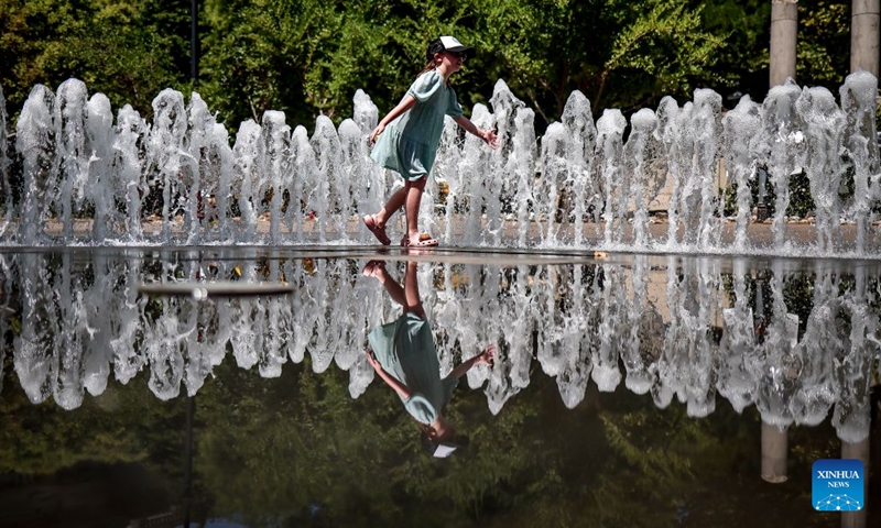 A girl plays in a fountain amid a heatwave in Budapest, Hungary, June 29, 2026. Hungary remains under a third-degree heat alert, the country's highest level, with temperatures forecast to reach between 35 and 40 degrees Celsius across much of the country in the coming days. (Photo: Xinhua)