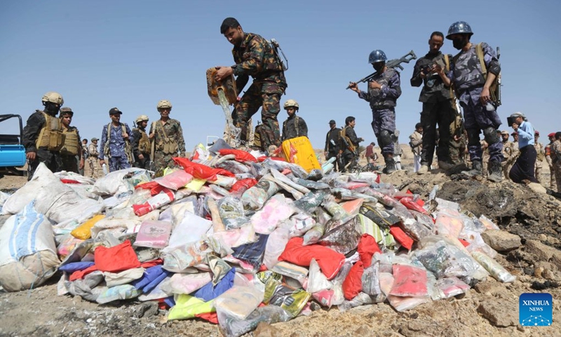Security soldiers prepare illicit narcotics to be burned in Saada, Yemen, on June 29, 2026. Houthi authorities destroyed tonnes of seized narcotics here on Monday. (Photo: Xinhua)