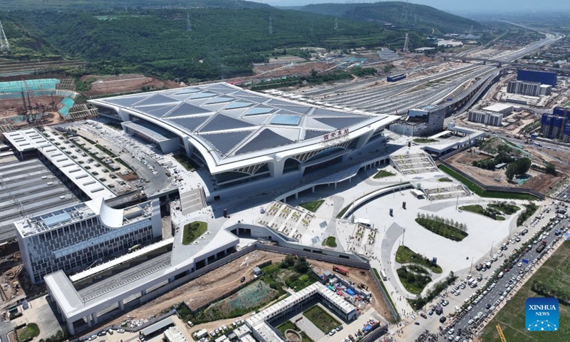 An aerial drone photo taken on June 27, 2026 shows Xi'an East Railway Station in Xi'an, northwest China's Shaanxi Province. The Xi'an-Shiyan high-speed railway is set to enter operation on Tuesday, cutting the fastest travel time between Xi'an, capital of northwest China's Shaanxi Province, and Wuhan, capital of central China's Hubei Province, to 2 hours and 41 minutes. It connects major tourist attractions including the Qinling Mountains and Wudang Mountain, and its operation is expected to boost local tourism. (Photo: Xinhua)
