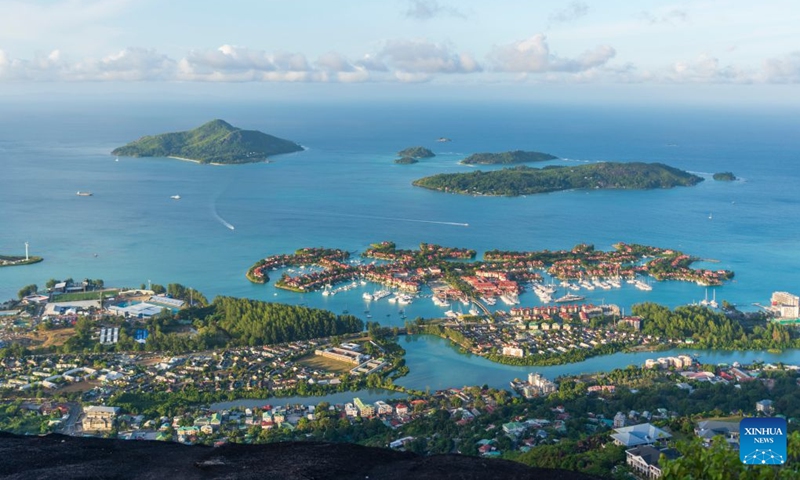 This photo shows the scenery at the beach (bottom) on Mahe Island, Seychelles, June 29, 2026. Mahe Island, the largest among all islands of the nation, is home to the capital city Victoria and a renowned tourist destination. (Photo: Xinhua)
