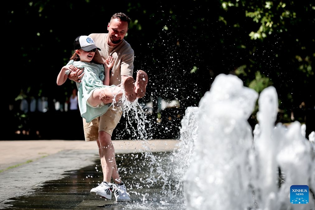 People play in a fountain amid a heatwave in Budapest, Hungary, June 29, 2026. Hungary remains under a third-degree heat alert, the country's highest level, with temperatures forecast to reach between 35 and 40 degrees Celsius across much of the country in the coming days. (Photo: Xinhua)