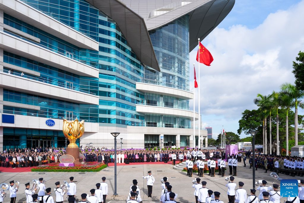 A flag-raising ceremony is held by the Hong Kong Special Administrative Region (HKSAR) government to celebrate the 29th anniversary of Hong Kong's return to the motherland in Hong Kong, south China, July 1, 2026. (Xinhua/Zhu Wei)