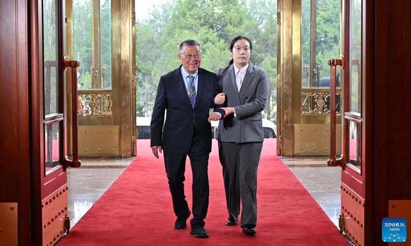 Zhao Yafu, recipient of the July 1 Medal, enters the Great Hall of the People in Beijing, capital of China, July 1, 2026. China will hold a gathering to celebrate the 105th founding anniversary of the Communist Party of China (CPC) at 10 a.m. Wednesday at the Great Hall of the People in Beijing. (Xinhua/Yin Bogu)