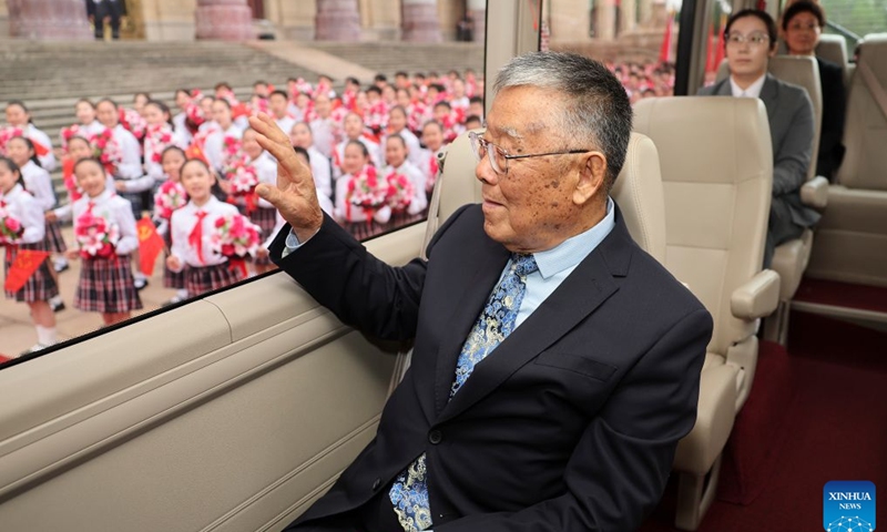 Zhao Yafu, recipient of the July 1 Medal, greets children outside the Great Hall of the People in Beijing, capital of China, July 1, 2026. A gathering in celebration of the 105th founding anniversary of the Communist Party of China (CPC) started at the Great Hall of the People on Wednesday morning in central Beijing. (Xinhua/Liu Weibing)