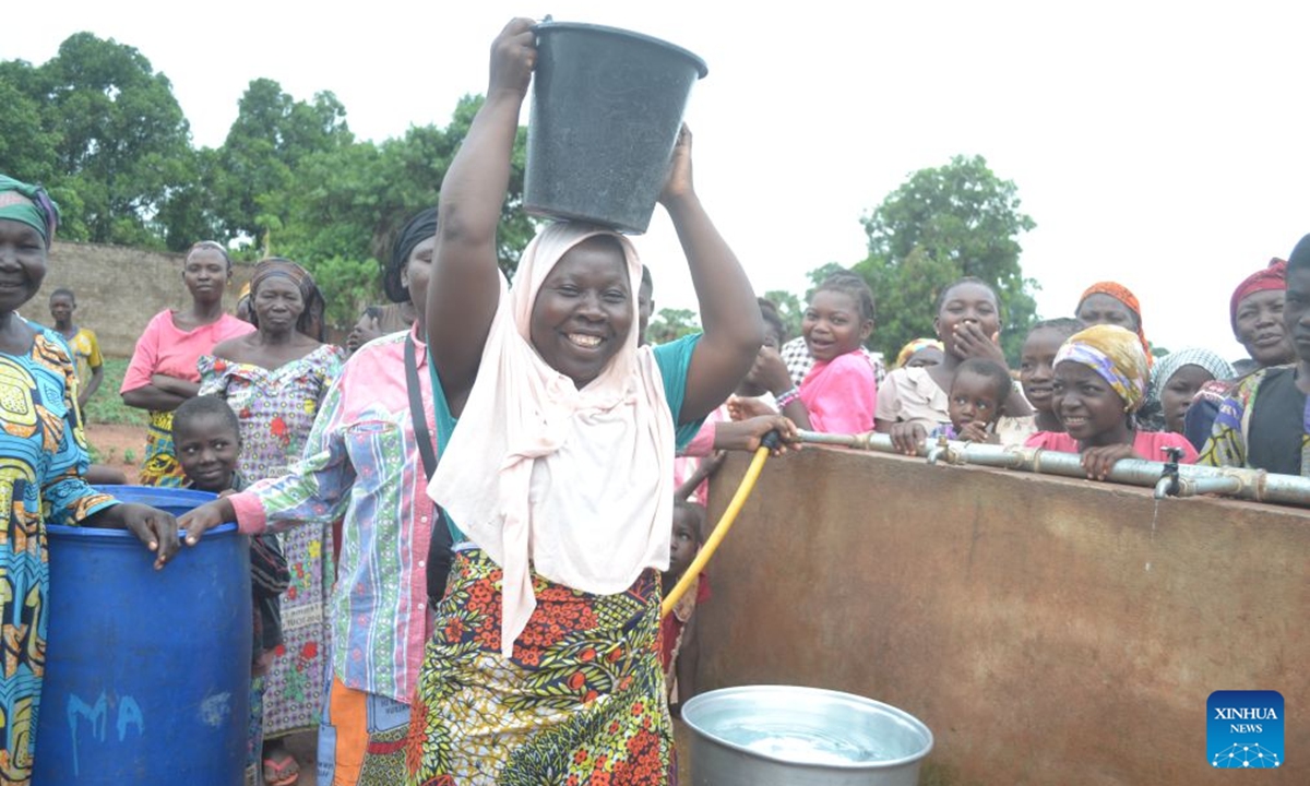 Residents fetch water at a water station under a China-aided water supply project in Koumra, Mandoul Province, Chad, June 5, 2026. TO GO WITH Feature: China-aided water supply project brings clean water to communities in southern Chad (Photo by Arnaud Mbaigolmem/Xinhua)