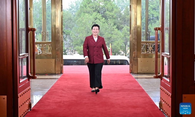 Wu Yaqin, recipient of the July 1 Medal, enters the Great Hall of the People in Beijing, capital of China, July 1, 2026. A gathering in celebration of the 105th founding anniversary of the Communist Party of China (CPC) started at the Great Hall of the People on Wednesday morning in central Beijing. (Xinhua/Yin Bogu)