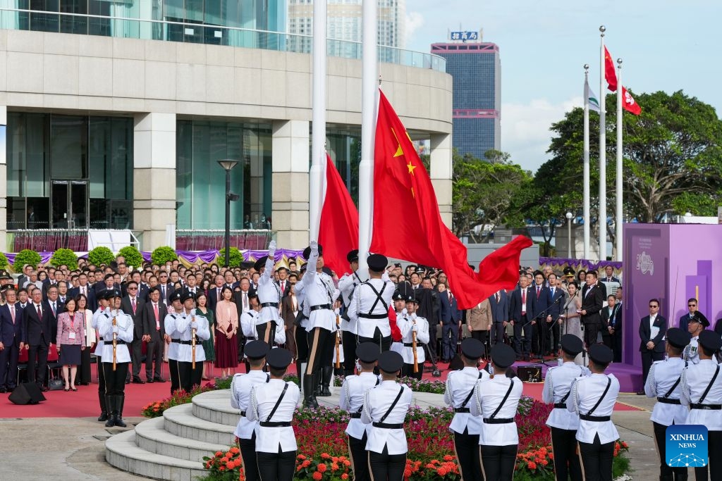 A flag-raising ceremony is held by the Hong Kong Special Administrative Region (HKSAR) government to celebrate the 29th anniversary of Hong Kong's return to the motherland in Hong Kong, south China, July 1, 2026. (Xinhua/Zhu Wei)