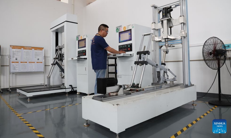 An engineer works at an ADO e-bike laboratory of Huizhou Ruijianxing New Energy Technology Co., Ltd. in Huizhou, south China's Guangdong Province, July 1, 2026. Huizhou Ruijianxing New Energy Technology Co., Ltd. is an e-bike manufacturer headquartered in Huizhou. Its brand, ADO e-bike, integrates AI-powered sensing technology to make riding smarter and safer. (Photo: Xinhua)