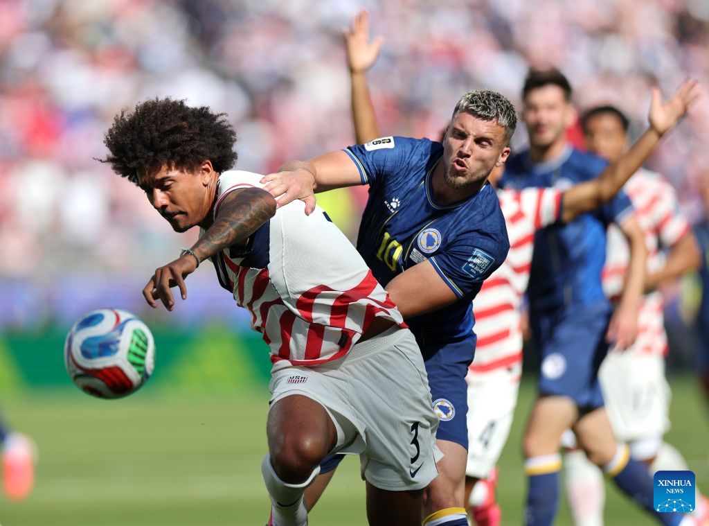 Chris Richards (front, L) of the United States vies with Ermedin Demirovic of Bosnia and Herzegovina during the round of 32 match between the United States and Bosnia and Herzegovina at the 2026 FIFA World Cup at San Francisco Bay Area Stadium in San Francisco, the United States, July 1, 2026. (Photo: Xinhua)