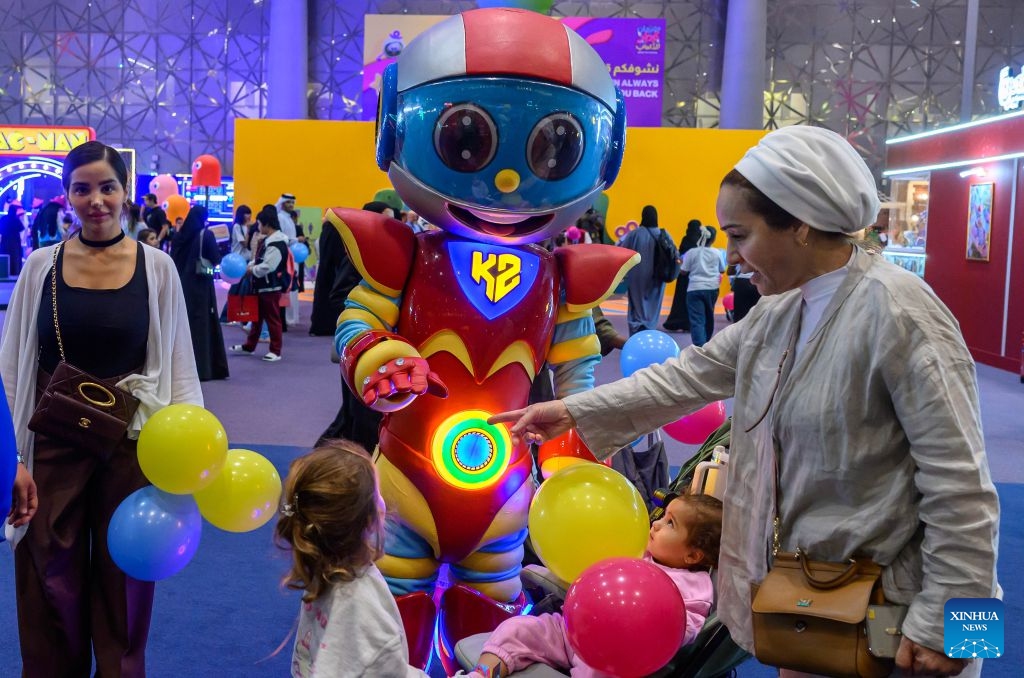 People have fun during the Qatar Toy Festival 2026 at Doha Exhibition and Convention Center (DECC) in Doha, Qatar, July 1, 2026. The festival opened here on Wednesday, and will run until July 31. (Photo: Xinhua)
