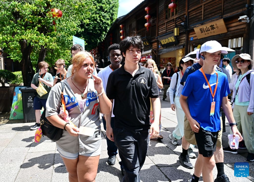 American youths visit the historic and cultural city block Three Lanes and Seven Alleys in Fuzhou, southeast China's Fujian Province, July 1, 2026. American youths attending the Bond with Kuliang: 2026 China-U.S. Youth Baseball Exhibition Games and Sports Festival started a cultural study tour in Fuzhou on Wednesday. (Photo: Xinhua)