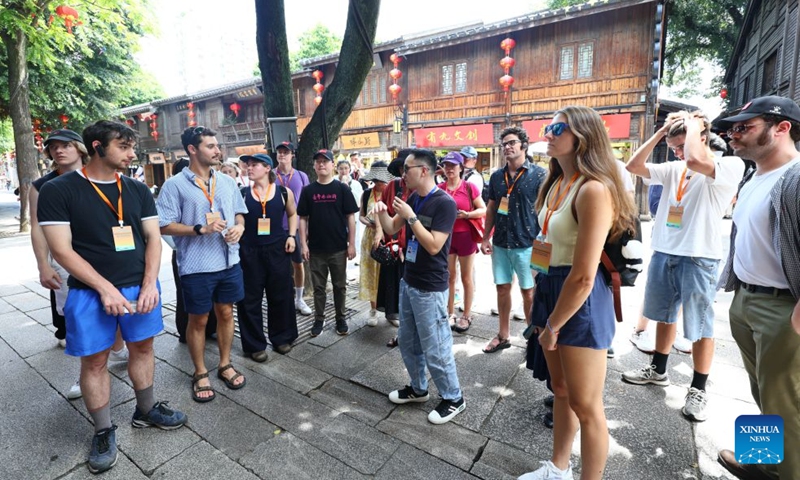 Players of the Near West Baseball Club from Virginia visit the historic and cultural city block Three Lanes and Seven Alleys in Fuzhou, southeast China's Fujian Province, July 1, 2026. American youths attending the Bond with Kuliang: 2026 China-U.S. Youth Baseball Exhibition Games and Sports Festival started a cultural study tour in Fuzhou on Wednesday. (Photo: Xinhua)