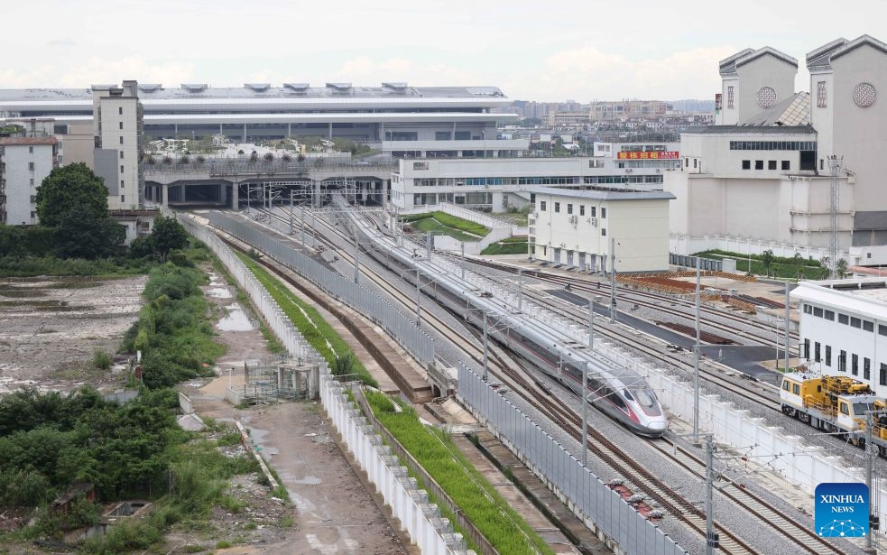 A passenger train departs from the Foshan Railway Station in Foshan, south China's Guangdong Province, July 1, 2026. The Foshan Railway Station opened on Wednesday, becoming another pivotal hub of the railway network in the Guangdong-Hong Kong-Macao Greater Bay Area. (Photo: Xinhua)