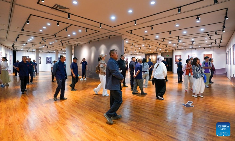 People visit an exhibition on historical facts of trials of Japanese war criminals at the Exhibition Hall of Evidences of Crime Committed by Unit 731 of the Japanese Imperial Army in Harbin, northeast China's Heilongjiang Province, July 1, 2026. The exhibition opened on Wednesday in Harbin. (Photo: Xinhua)
