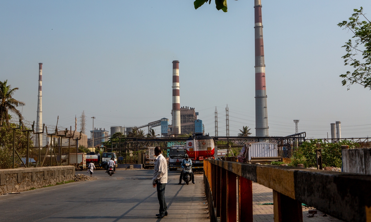 Chimneys stand at the Tata Power's Trombay Thermal Power Station in Mumbai, India on April 23, 2026. Photo: VCG