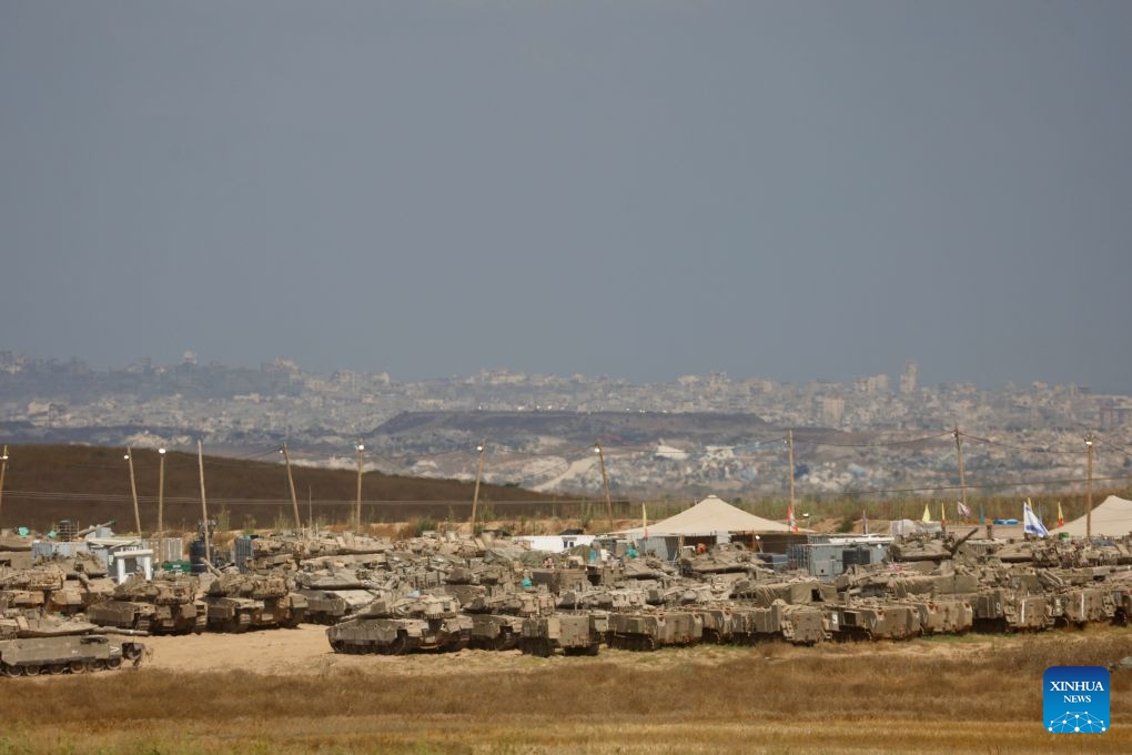 Israeli military vehicles are seen near Kibbutz Reim bordering Gaza in southern Israel, July 2, 2026. (Photo by Jamal Awad/Xinhua)
