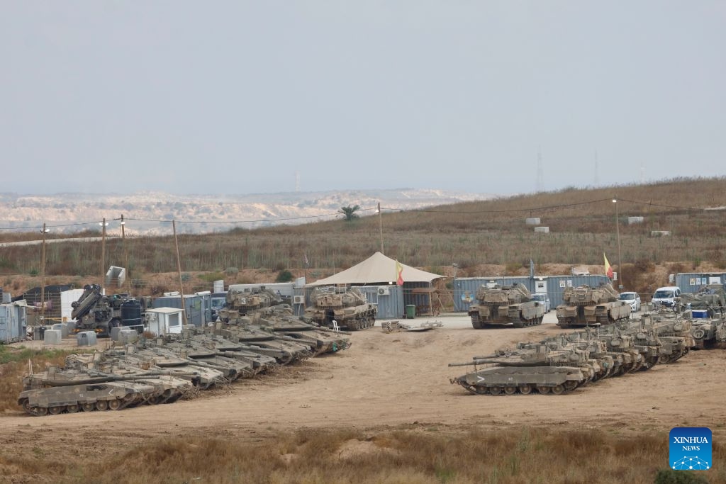 Israeli military vehicles are seen near Kibbutz Reim bordering Gaza in southern Israel, July 2, 2026. (Photo by Jamal Awad/Xinhua)