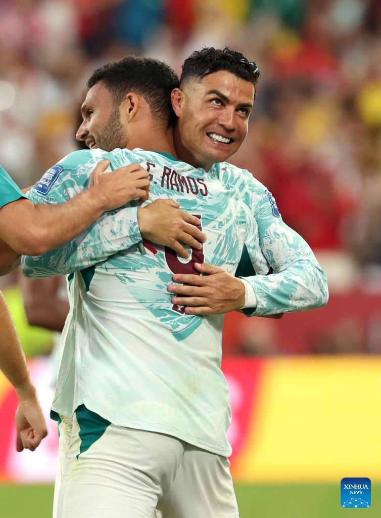 Cristiano Ronaldo (R) of Portugal hugs Goncalo Ramos after winning the round of 32 match between Portugal and Croatia at the 2026 FIFA World Cup at Toronto Stadium in Toronto, Canada, July 2, 2026. (Photo by Zou Zheng/Xinhua)