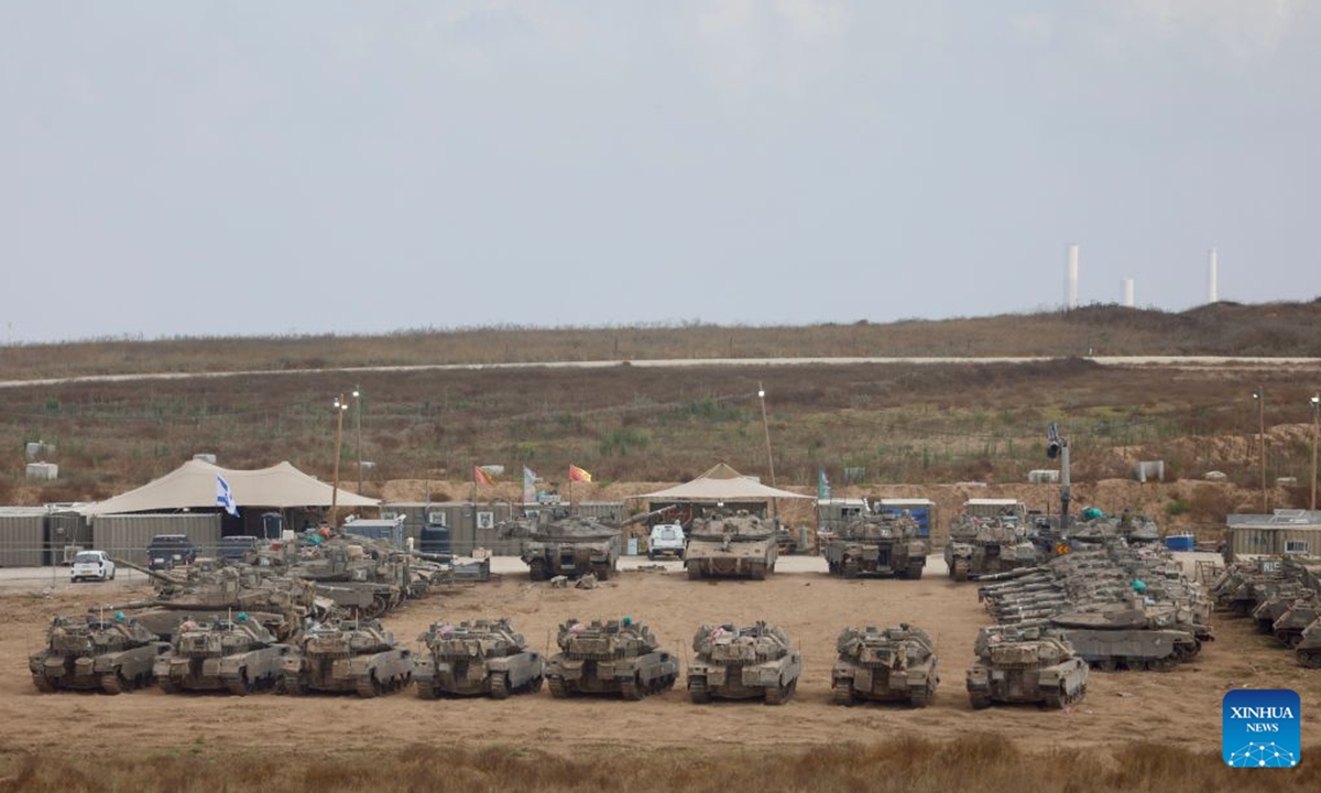 Israeli military vehicles are seen near Kibbutz Reim bordering Gaza in southern Israel, July 2, 2026. (Photo by Jamal Awad/Xinhua)