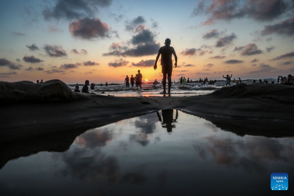 Palestinians relax on a beach west of Gaza City on July 3, 2026. (Photo: Xinhua)