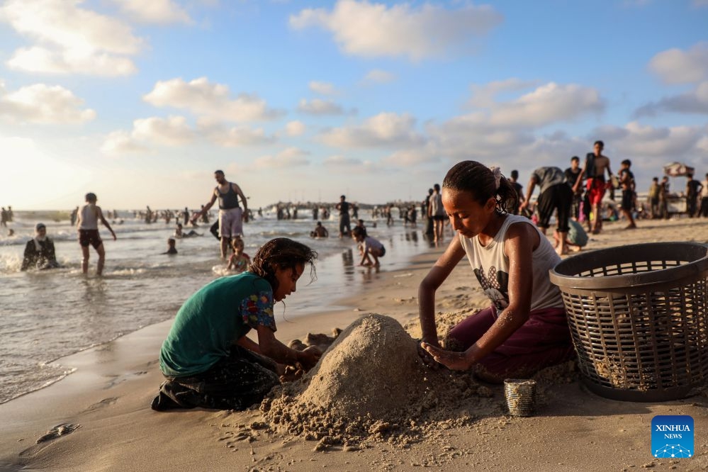 Palestinians relax on a beach west of Gaza City on July 3, 2026. (Photo: Xinhua)
