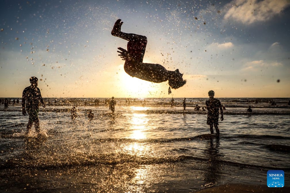 Palestinians relax on a beach west of Gaza City on July 3, 2026. (Photo: Xinhua)