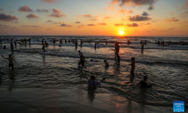 Palestinians relax on a beach west of Gaza City on July 3, 2026. (Photo: Xinhua)