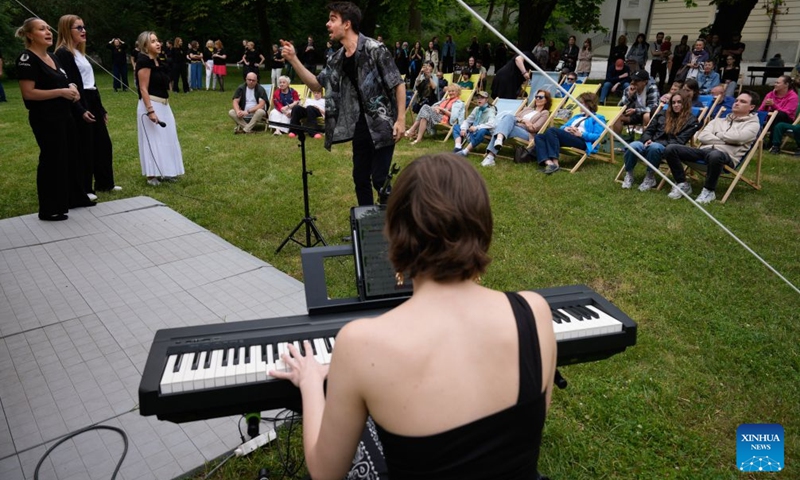 Performers are seen at an open-air summer music festival at the Lazienki Park in Warsaw, Poland, July 4, 2026. The annual open-air summer music festival is being held at the Lazienki Park. Running over four weekends from July 4 to 26 this year, the festival features free performances of classical, jazz and traditional music by Polish and international artists. (Photo by Jaap Arriens/Xinhua)