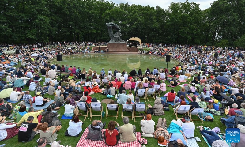 People enjoy an open-air Chopin concert at the Royal Lazienki Park in Warsaw, Poland, July 5, 2026.
The 67th season of Chopin Concerts kicked off here on Sunday, and will last to Sept. 27. (Photo by Aleksy Witwicki/Xinhua)