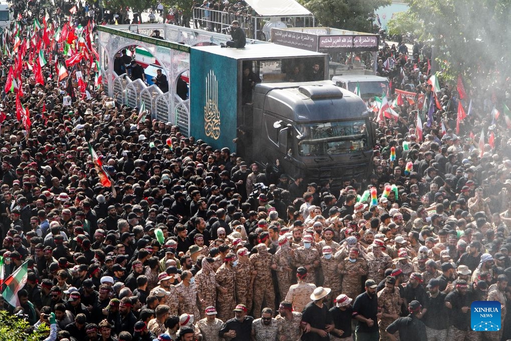 People take part in a procession to bid farewell to Iran's late Supreme Leader Ali Khamenei in Tehran, Iran, July 6, 2026. (Photo: Xinhua)
