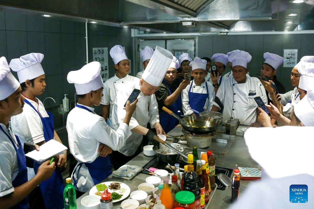 Locals learn Chinese culinary skills during a five-day Chinese culinary training program at the Center for Tourism Development in Yangon, Myanmar, July 6, 2026. (Photo: Xinhua)