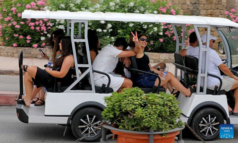 Tourists take a vehicle for visiting in Byblos, Lebanon, July 5, 2026. (Photo: Xinhua)