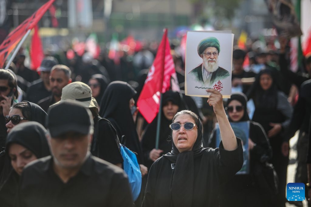 People take part in a procession to bid farewell to Iran's late Supreme Leader Ali Khamenei in Tehran, Iran, July 6, 2026. (Photo: Xinhua)