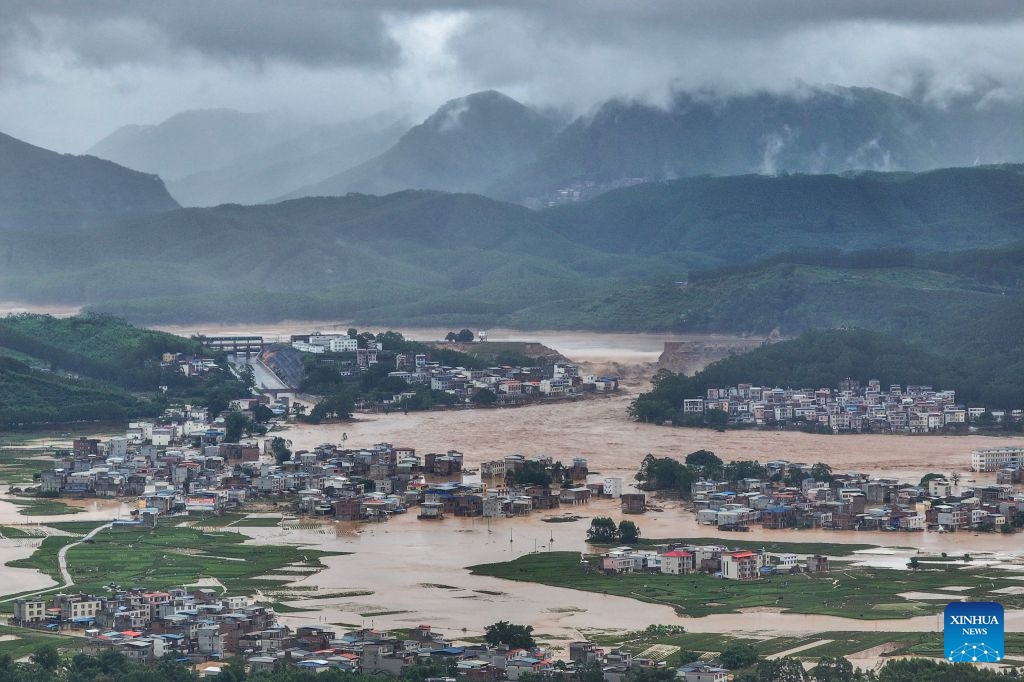 A drone photo taken on July 6, 2026 shows the Liulan Reservoir in the distance that was breached due to heavy rains in Hengzhou, Nanning City, south China's Guangxi Zhuang Autonomous Region. A severe breach occurred at a reservoir in Hengzhou, Nanning City, in south China's Guangxi Zhuang Autonomous Region on Monday morning, prompting an immediate escalation of the emergency response, local authorities said. (Photo: Xinhua)