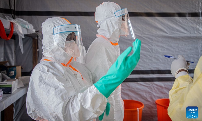 Medical workers put on protective suits at an Ebola treatment center in Bunia, the capital of Ituri Province in the Democratic Republic of the Congo, July 6, 2026. The death toll from the latest Ebola outbreak in the Democratic Republic of the Congo has surpassed 500, according to a report released Sunday by the country's health authorities. (Photo: Xinhua)