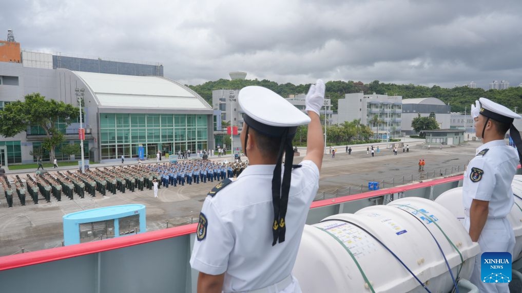 Sailors aboard the guided-missile frigate Hengyang wave goodbye when sailing out of the pier of the Chinese People's Liberation Army (PLA) Hong Kong Garrison's naval base on Stonecutters Island in Hong Kong, south China, July 6, 2026. A fleet of the PLA Navy, consisting of guided-missile destroyer Nanning and guided-missile frigate Hengyang, left the Hong Kong Special Administrative Region (HKSAR) on Monday, wrapping up a five-day port call featuring open-ship events and cultural exchange activities. (Photo: Xinhua)