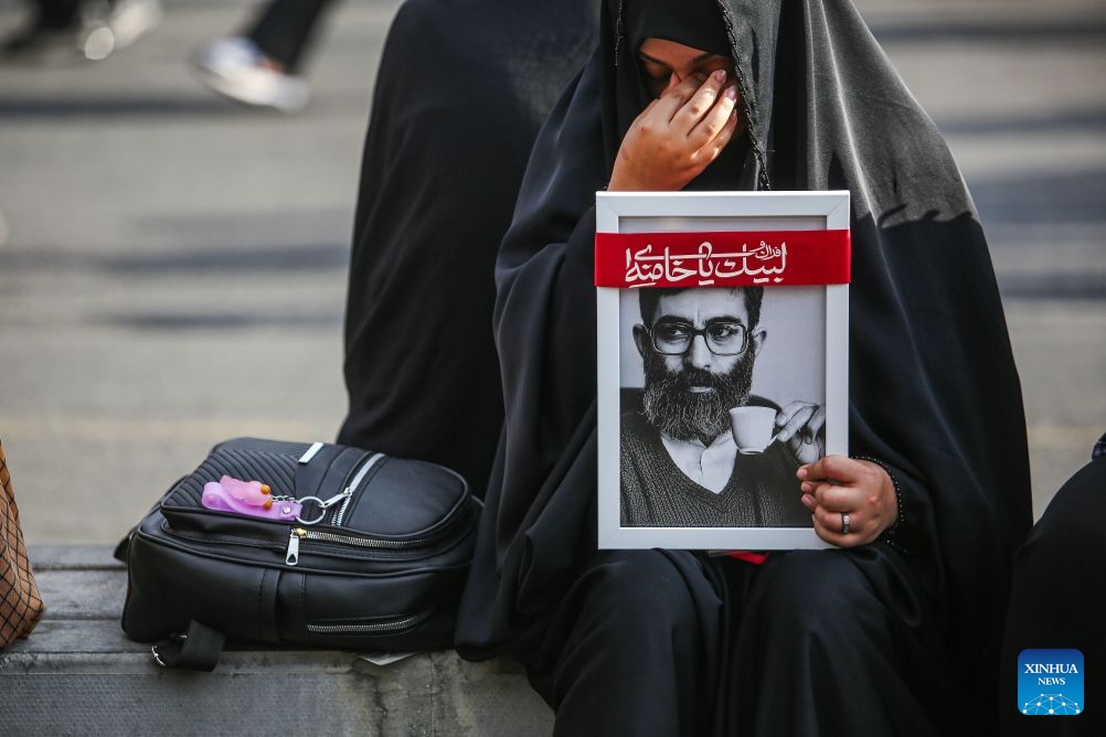 A woman mourns in a procession to bid farewell to Iran's late Supreme Leader Ali Khamenei in Tehran, Iran, July 6, 2026. (Photo: Xinhua)