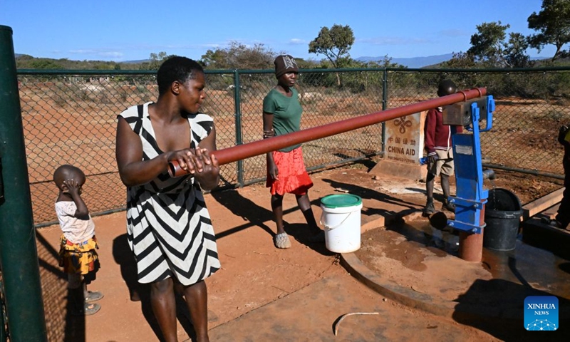 A woman pumps water from a China-aided hand pump in Bumba Village, Manicaland, Zimbabwe, June 29, 2026. (Photo: Xinhua)