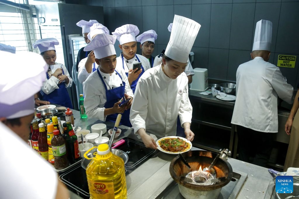 Locals learn Chinese culinary skills during a five-day Chinese culinary training program at the Center for Tourism Development in Yangon, Myanmar, July 6, 2026. (Photo: Xinhua)