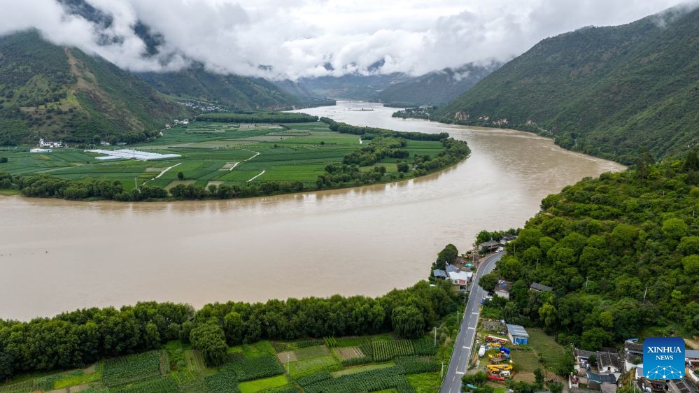 An aerial drone photo taken on July 2, 2026 shows a view along the Yunnan-Xizang Highway in Yulong Naxi Autonomous County of Lijiang, southwest China's Yunnan Province. Fifty years ago on this day, the Yunnan-Xizang Highway, a vital trunk road in China's southwestern border regions, was fully completed and opened to traffic. Stretching 715 kilometers from Xiaguan County in Yunnan Province to Mangkam County in Xizang Autonomous Region, the route crosses the Jinsha and Lancang rivers, traverses the rugged and geologically complex Hengduan Mountains, and climbs over snow-capped passes. (Photo: Xinhua)