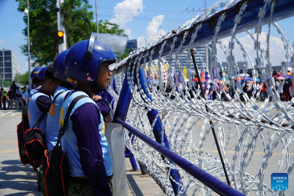 Policemen stand guard outside the Senate of the Philippines in Pasay City, the Philippines, July 6, 2026. The Philippine Senate on Monday commenced the impeachment trial against Vice President Sara Duterte. On May 11, the House of Representatives of the Philippines secured the required number of votes to impeach Sara Duterte. The Philippine Senate convened as an impeachment court on May 18, and the court held a pre-trial conference for the impeachment case in June. (Photo: Xinhua)
