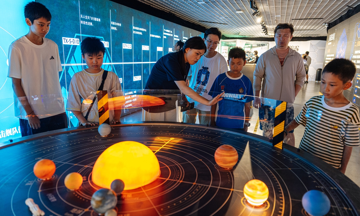 Visitors tour a space-themed exhibition integrating science fiction and popular science at the China Millennium Monument in Beijing on July 8, 2026. Photo: Li Hao/GT