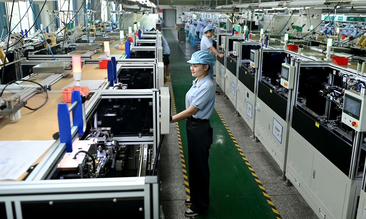 Workers assemble electronic products on smart production lines to fulfill orders at an electronics manufacturing firm in Shaoyang city, Central China's Hunan Province, on July 8, 2026. The region is encouraging enterprises to increase investment in technological innovation for high-end, digital-intelligent and green manufacturing. Photo: VCG